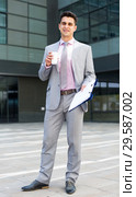 Businessman standing outdoor. Стоковое фото, фотограф Яков Филимонов / Фотобанк Лори