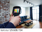 thermal imaging camera inspection of building. check temperature. Стоковое фото, фотограф Дмитрий Калиновский / Фотобанк Лори