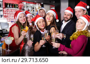 Friends on new year eve party in bar. Стоковое фото, фотограф Яков Филимонов / Фотобанк Лори