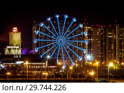 Night view at the center of the Chelyabinsk city. Panorama view of the Chelyabinsk city, Ferris wheel at night. Shanghai Cooperation Organisation (SCO) 2020. (2018 год). Редакционное фото, фотограф Евгений Бобков / Фотобанк Лори