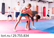 Kids practicing in pair self-protection. Стоковое фото, фотограф Яков Филимонов / Фотобанк Лори