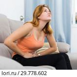 female holding hands on the illness stomache. Стоковое фото, фотограф Яков Филимонов / Фотобанк Лори