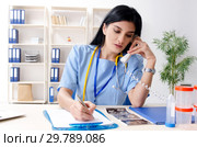 Female doctor gynecologist working in the clinic. Стоковое фото, фотограф Elnur / Фотобанк Лори