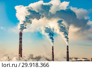 Производственные заводские трубы на фоне синего неба . Концепция загрязнения окружающей среды . Стоковое фото, фотограф Сергеев Валерий / Фотобанк Лори