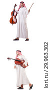 Arab man playing cello isolated on white. Стоковое фото, фотограф Elnur / Фотобанк Лори