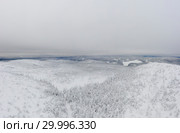 Aerial panorama of winter snowy landscape with forest, Kevakka mountain and lake, Paanajärvi, Karelia, Russia. Стоковое фото, фотограф Кирилл Трифонов / Фотобанк Лори