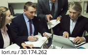 Serious business people working at office. Стоковое видео, видеограф Яков Филимонов / Фотобанк Лори