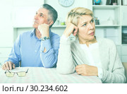 Man and woman 50-54 years old are offended at each other. Стоковое фото, фотограф Яков Филимонов / Фотобанк Лори