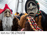 Ряженые во время празднования Масленицы на Манежной площади в центре города Москвы в рамках фестиваля "Московская Масленица 2019", Россия. Редакционное фото, фотограф Николай Винокуров / Фотобанк Лори