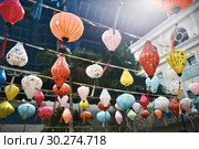 Asian city street decorated with traditional multicolored chinese lanterns. Стоковое фото, фотограф Andriy Bezuglov / Фотобанк Лори