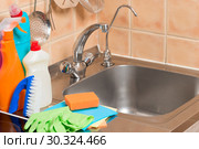 close-up objects in the kitchen - faucet, sink and cleaning products. Стоковое фото, фотограф Константин Лабунский / Фотобанк Лори