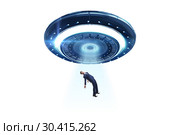 Flying saucer abducting young businessman. Стоковое фото, фотограф Elnur / Фотобанк Лори