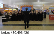 Choir performing at Sheremetyevo Airport on Day of Passenger (2017 год). Редакционное видео, видеограф Данил Руденко / Фотобанк Лори