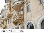 The old Soviet multystoried building with balconies, Krasnooktyabrsky district, Volgograd (2019 год). Редакционное фото, фотограф Владимир Арсентьев / Фотобанк Лори