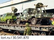 Improvised gun trucks of terrorists on a railway flatcar (2019 год). Редакционное фото, фотограф Евгений Харитонов / Фотобанк Лори