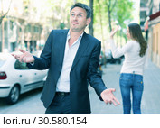 Disappointed man in quarrel with girlfriend. Стоковое фото, фотограф Яков Филимонов / Фотобанк Лори