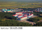 Modern area recently built on the outskirts of the Siberian city of Khanty-Mansiysk. Стоковое фото, фотограф Круглов Олег / Фотобанк Лори