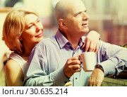 Couple drinking tea at balcony. Стоковое фото, фотограф Яков Филимонов / Фотобанк Лори