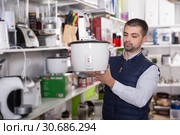 male is standing with new multivariate. Стоковое фото, фотограф Яков Филимонов / Фотобанк Лори