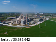 Вид на Красносельский завод строительных материалов ОАО "Красносельскстройматериалы" солнечным весенним днем (аэрофотография). Гродненская область, Белоруссия (2018 год). Редакционное фото, фотограф Виктор Карасев / Фотобанк Лори