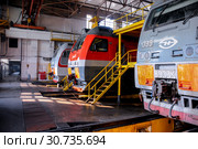 Russia, Khabarovsk, October 22, 2013: Locomotive depot of Khabarovsk, repair shop, locomotives repair. Редакционное фото, фотограф Катерина Белякина / Фотобанк Лори