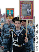 Москва, молодой кадет на марше "Бессмертный полк" (2019 год). Редакционное фото, фотограф Дмитрий Неумоин / Фотобанк Лори