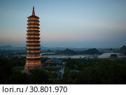 Evening view of Bai Dinh Pagoda in Ninh Binh, Vietnam. Стоковое фото, фотограф Данил Руденко / Фотобанк Лори