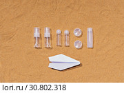 Travel set of containers for hand luggage cosmetics on an airplane. Стоковое фото, фотограф Kira_Yan / Фотобанк Лори
