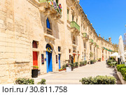beautiful baroque building with bright doors and shutters built with sandstone (2019 год). Редакционное фото, фотограф Ирина Мойсеева / Фотобанк Лори
