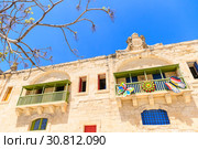 beautiful baroque building with bright doors and shutters built with sandstone (2019 год). Стоковое фото, фотограф Ирина Мойсеева / Фотобанк Лори