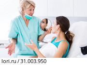 Dissatisfied woman in cosmetician office. Стоковое фото, фотограф Яков Филимонов / Фотобанк Лори