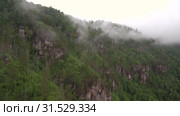 Уральские горы. Розовые скалы в тумане. Ural Mountains. Pink rocks in the mist. Стоковое видео, видеограф Евгений Романов / Фотобанк Лори