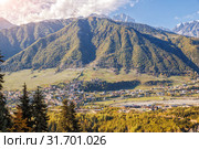 Caucasian landscape, aerial view of the town Mestia in mountain valley. Upper Svaneti, Georgia (2018 год). Стоковое фото, фотограф Юлия Бабкина / Фотобанк Лори