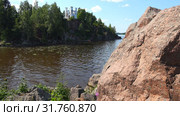Landscape with a lake and a building of knightly times on a hill of rock. Стоковое видео, видеограф Aleksandr Sulimov / Фотобанк Лори
