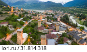 Panoramic view of Svan Towers in Mestia at sunset, Svaneti region, Georgia. It is a highland townlet in the northwest of Georgia, at an elevation of 1500 meters in the Caucasus Mountains. Стоковое фото, фотограф Mikhail Starodubov / Фотобанк Лори