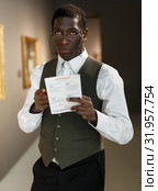 Positive african man in museum. Стоковое фото, фотограф Яков Филимонов / Фотобанк Лори