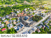 Panoramic view of Svan Towers in Mestia, Svaneti region, Georgia. It is a highland townlet in the northwest of Georgia, at an elevation of 1500 meters in the Caucasus Mountains. Редакционное фото, фотограф Mikhail Starodubov / Фотобанк Лори