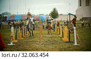 BULGAR, RUSSIA 11-08-2019: Knights having a battle on the field - running on each other and breaking the plastic spear - assistens helping with preparation for the battle. Редакционное видео, видеограф Константин Шишкин / Фотобанк Лори