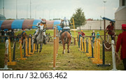 BULGAR, RUSSIA 11-08-2019: Knights having a battle on the field - running on each other and breaking the plastic spear -medieval festival. Редакционное видео, видеограф Константин Шишкин / Фотобанк Лори