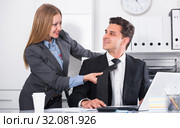 Sexual harassment between colleagues. Стоковое фото, фотограф Яков Филимонов / Фотобанк Лори