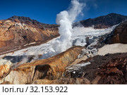 Fumarola of an active volcano on the peninsula of Kamchatka (2013 год). Стоковое фото, фотограф Сергей Краснощеков / Фотобанк Лори