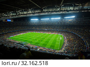 Football field and audience at stadium Nou Camp, Barcelona (2015 год). Редакционное фото, фотограф Яков Филимонов / Фотобанк Лори