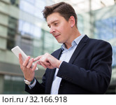 Advanced user of high modern technology. Стоковое фото, фотограф Яков Филимонов / Фотобанк Лори