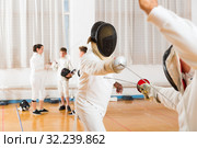 fencing duel with rapier of two coaches. Стоковое фото, фотограф Яков Филимонов / Фотобанк Лори