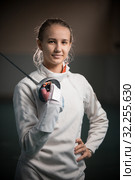 A portrait of a young woman fencer with a singlestick. Стоковое фото, фотограф Константин Шишкин / Фотобанк Лори