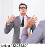 Politician planning speach in front of mirror. Стоковое фото, фотограф Elnur / Фотобанк Лори