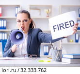 Angry businesswoman issuing termination notice. Стоковое фото, фотограф Elnur / Фотобанк Лори