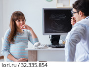 The pregnant woman visiting doctor for regular check-up. Стоковое фото, фотограф Elnur / Фотобанк Лори