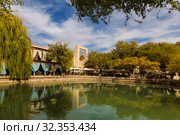 The pond house of Nadir-Run on the Central square Lyabi-Khauz with the khanaka divan-Begi in the background. Bukhara, Uzbekistan (2019 год). Стоковое фото, фотограф Наталья Волкова / Фотобанк Лори
