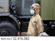 Mannequin dressed in chemical protection suit and gas mask. Стоковое фото, фотограф Олег Белов / Фотобанк Лори